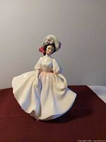 Full front view of the Royal Doulton Sunday Best figurine