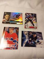 All four NHL trading cards laid out