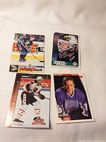 Group shot of all four hockey cards laid out
