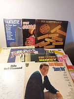 Overall view of stack showing multiple album covers