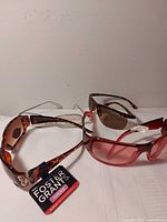 All four pairs grouped, tag visible on Foster Grant pair