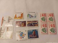 All stamps laid out: pairs, singles, 5-cent block