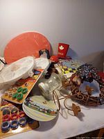 Overview of mixed household items on table
