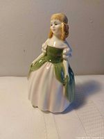 Front view of Royal Doulton Penny figurine