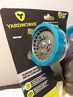 Front of Yardworks nozzle on retail card, showing brand and metal head