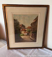 Full view of framed etching, showing artwork, mat, frame