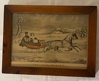 Front view of framed lithograph showing entire image and wood frame