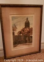 Front view of framed hand-colored engraving with mat and visible signature