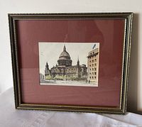 Front view of framed print showing mat and frame