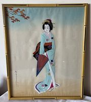 Front view of framed silk painting showing full artwork and bamboo frame