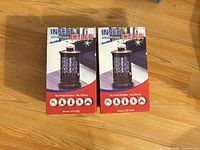 Front view of two BT-9200 insect killer boxes