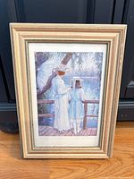 Full view of framed print showing artwork, frame style and glass