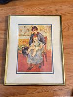 Front view of framed Renoir reproduction print