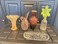 Group view of all five glass pieces