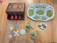 Overview of lot showing organizer box, serving tray, ornaments, picks, figurine