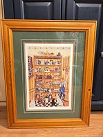 Framed limited edition print full view in light oak frame