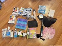 All items laid out on floor displaying quantity and variety