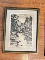 Front view of framed monochrome landscape print