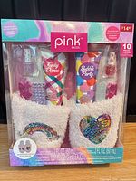 Front of boxed Pink Dazzle spa gift set showing all contents