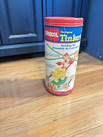 Front of Playskool Tinkertoy tube with lid