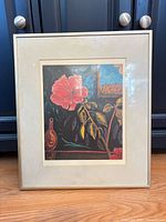 Front view of framed artwork showing image, mat and frame