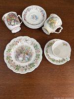 Group shot of all nine Royal Doulton Brambly Hedge pieces