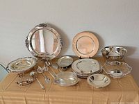 Group shot of all silverplate items on table