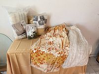 All curtain panels and tiebacks displayed on table