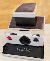 Front view of Polaroid SX-70 Land Camera open position