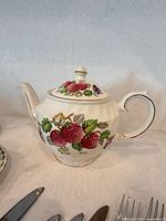 Teapot with fruit motif