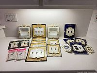 Group shot of all packaged and loose decorative plates and holders