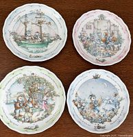 Group shot of all four Royal Doulton Owl & Pussy-Cat plates