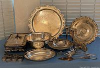 Group shot of all silver-plated items on table