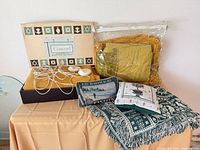 Entire lot showing electric blanket, linens, throw and pillows