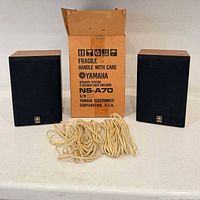 Pair of Yamaha NS-A70 speakers with box and speaker wire