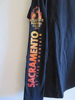 Right sleeve showing full anniversary graphic text and logo