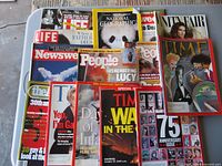 Stacked magazines showing variety of titles and covers