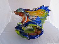 front view of multicolored glass swordfish ashtray