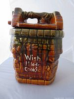 Front view showing wishing well design and inscription