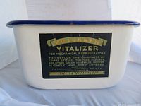 Side view showing Vitalizer label and blue rim