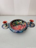 Top view showing bowl interior design and both candlestick holders