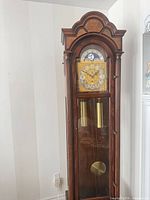 Full view of Hentschel grandfather clock in corner