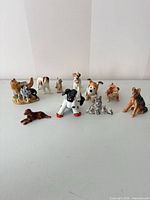All ten dog figurines group front view