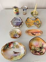 Group shot of all nine Nippon hand-painted pieces