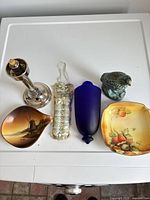 All six decorative items displayed on white surface