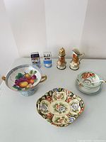 Group overview showing all Noritake porcelain pieces on tabletop