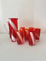 Entire set showing pitcher, bud vase, six tumblers