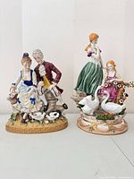 Both porcelain figurines front view