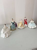 Front view of all six figurines