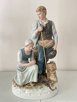 Front view of Royal Dux porcelain figurine showing full composition